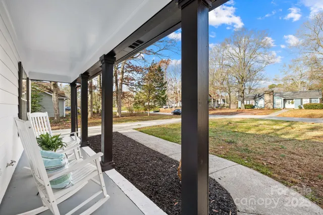 a view of a floor to yard from a balcony