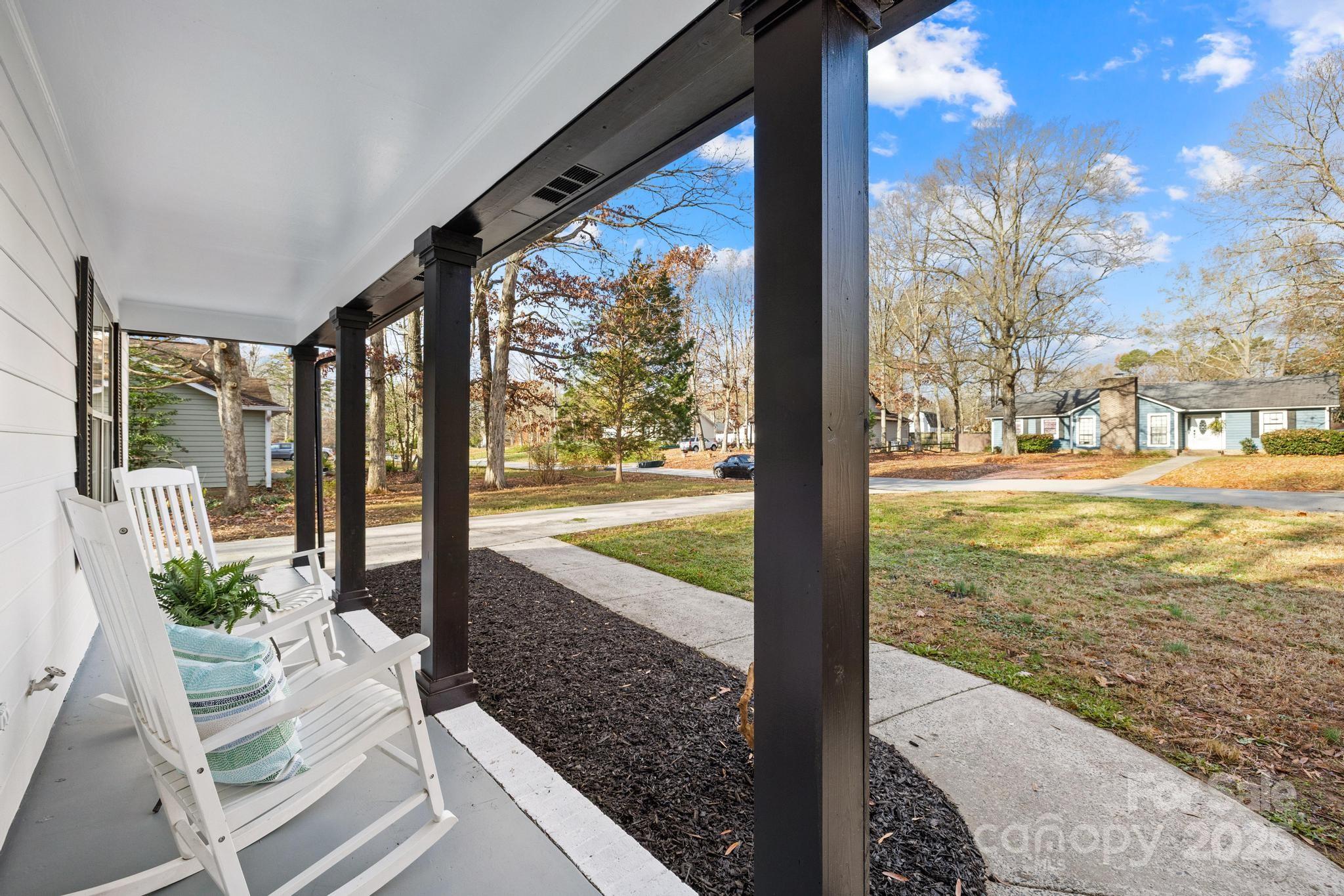 a view of a floor to yard from a balcony