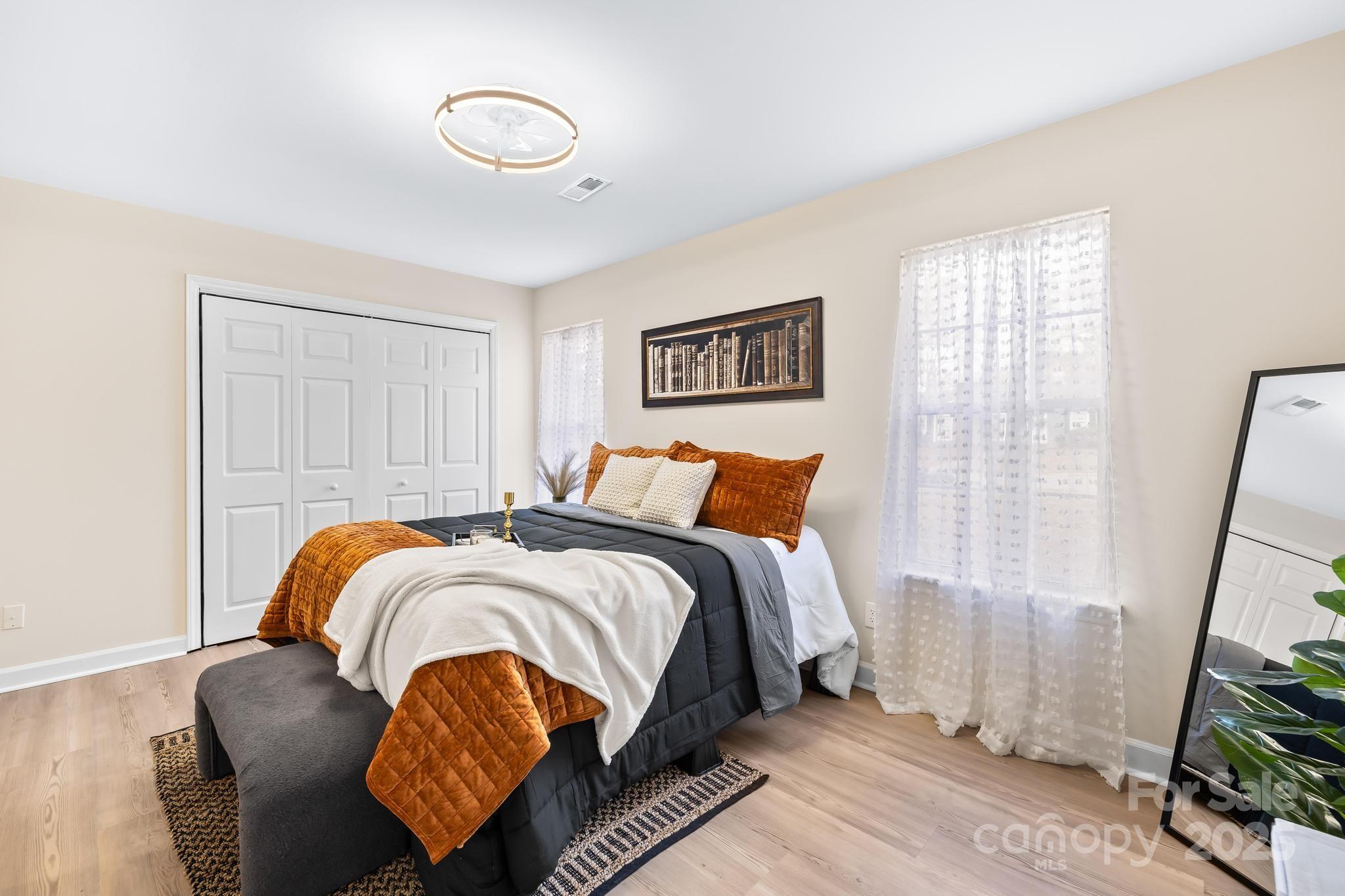 6306 Fox Hunt Road Indian Trail, NC 28079 - Photo 14 of 20 a bedroom with a bed and a window