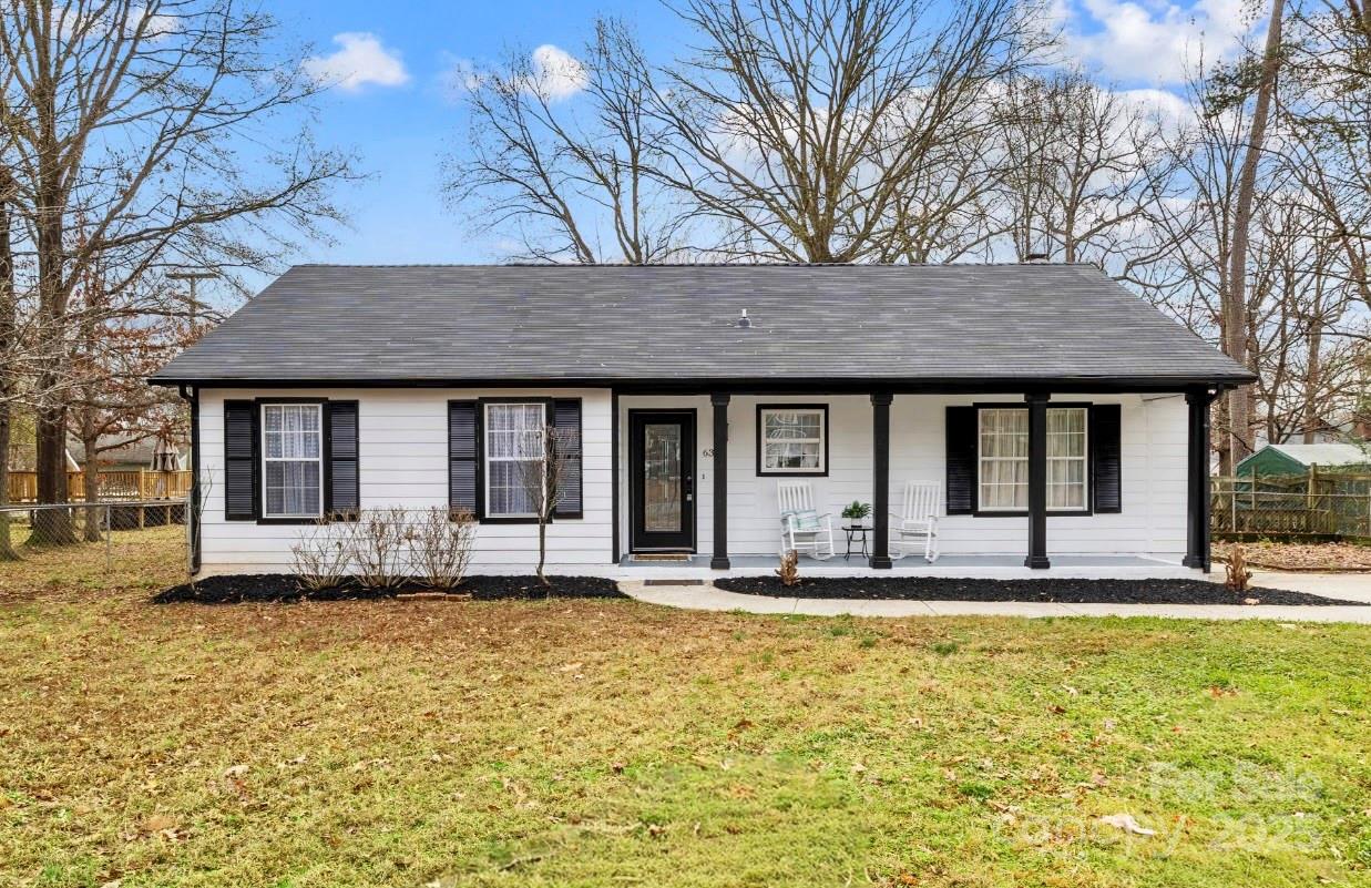 6306 Fox Hunt Road Indian Trail, NC 28079 - Photo 2 of 20 a house view with a garden space