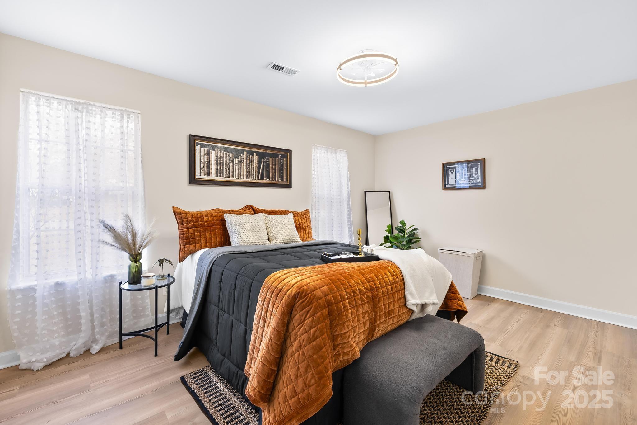 6306 Fox Hunt Road Indian Trail, NC 28079 - Photo 6 of 20 a bedroom with bed and a window