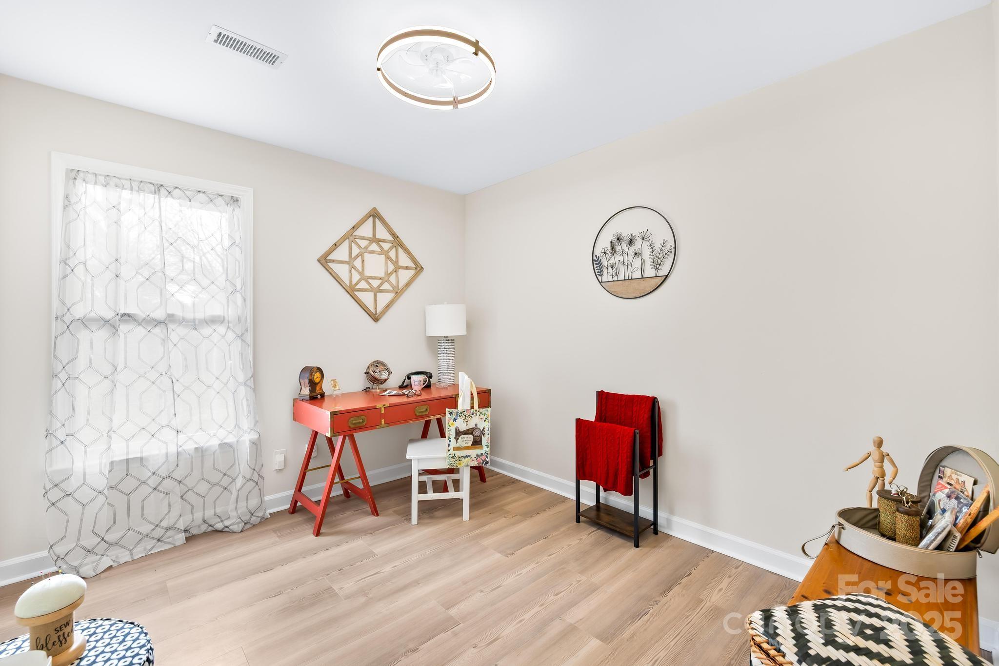 6306 Fox Hunt Road Indian Trail, NC 28079 - Photo 9 of 20 a view of a room with gym equipment