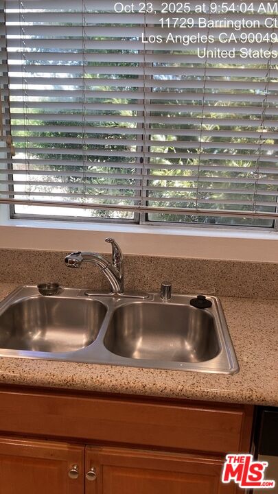 11730 Sunset Boulevard Los Angeles, CA 90049 - Photo 11 of 20 a close view of sink and granite counter top
