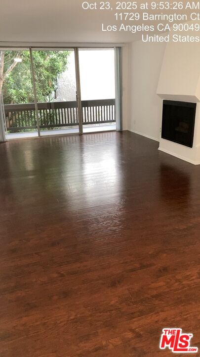 11730 Sunset Boulevard Los Angeles, CA 90049 - Photo 4 of 20 a view of a floor to an empty room and window