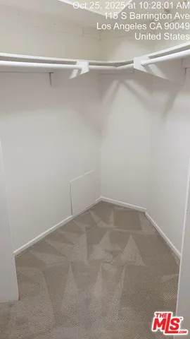 a view of a room with racks on the wall