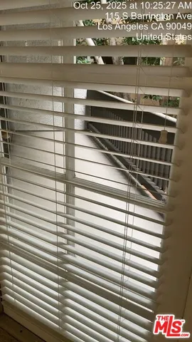a stove top oven sitting inside of a kitchen