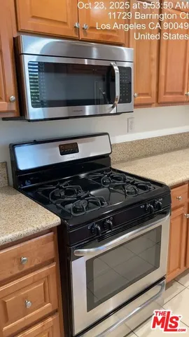a close view of sink and granite counter top