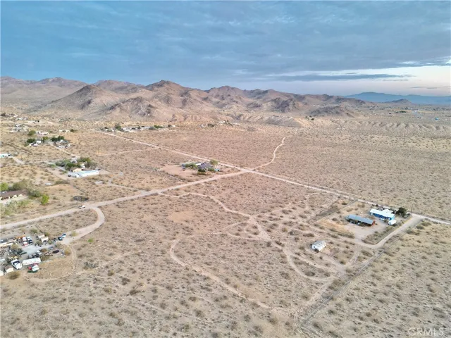 an aerial view of beach and city space