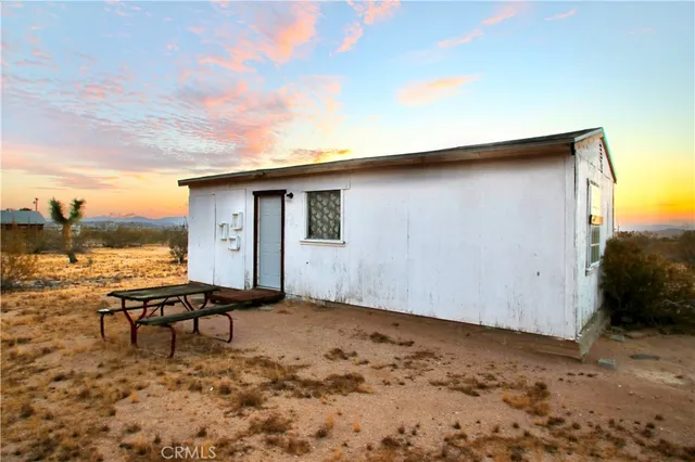 a view of a fireplace in a field