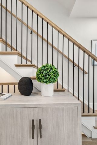 a vase of flowers sitting on a table