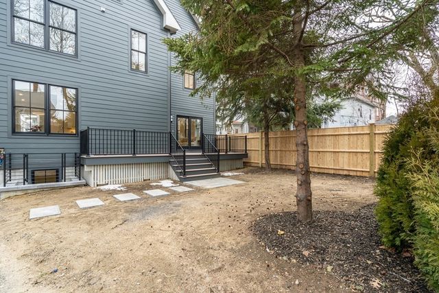 a view of a backyard of the house