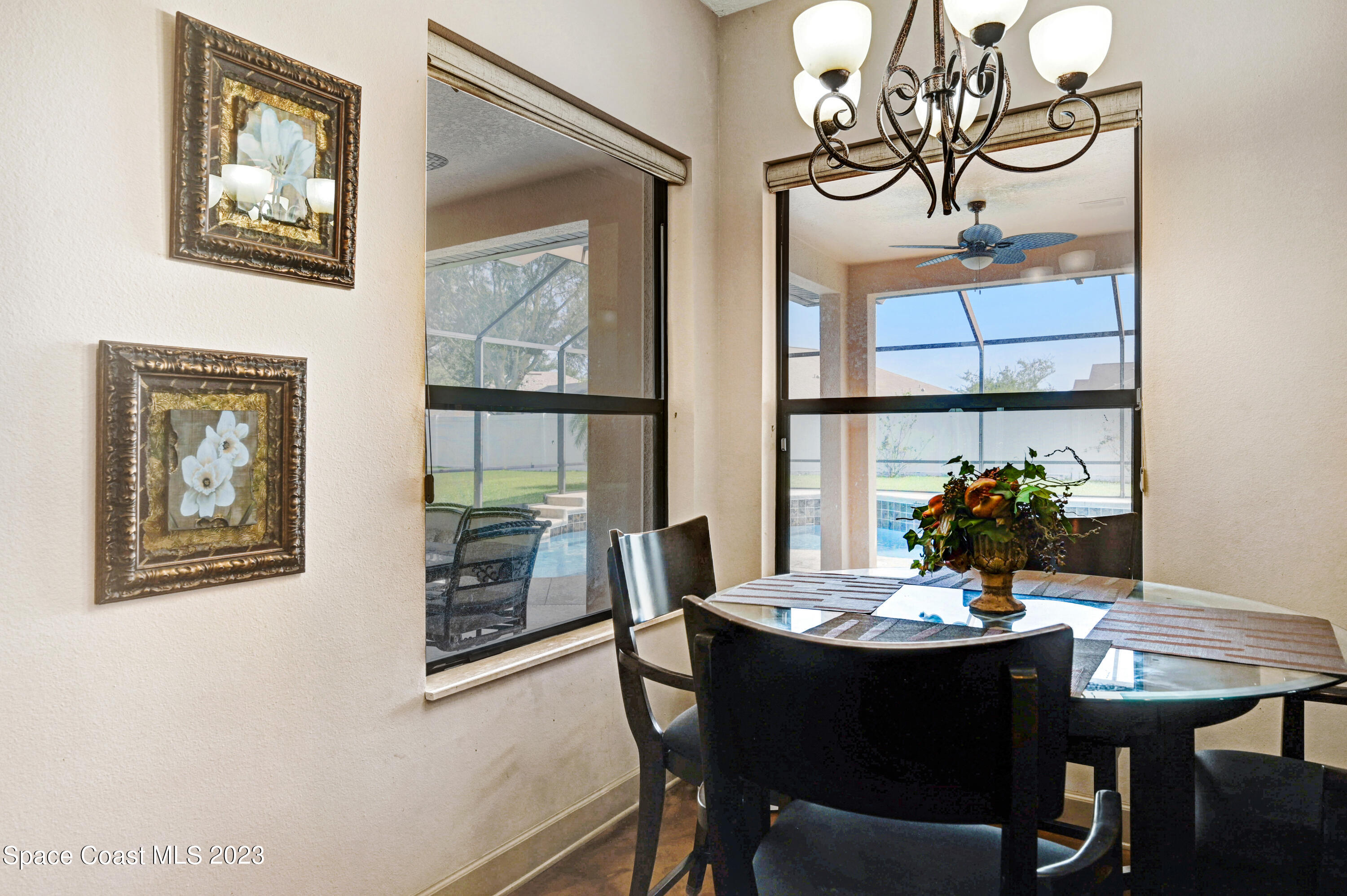 1317 Centennial Way Rockledge, FL 32955 - Photo 13 of 38 a view of a dining room with furniture window and outside view