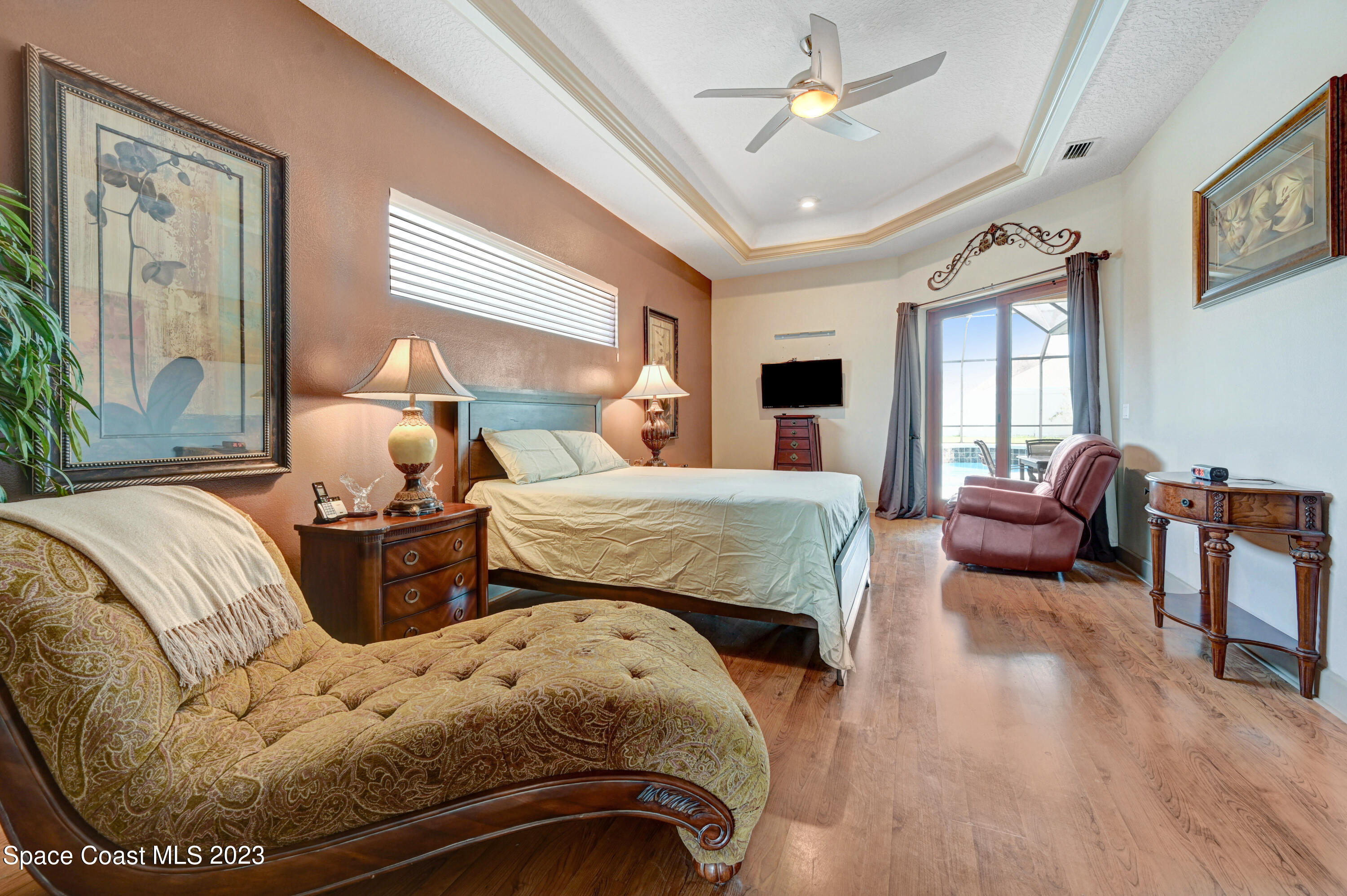 1317 Centennial Way Rockledge, FL 32955 - Photo 21 of 38 a bedroom with two beds and a large window