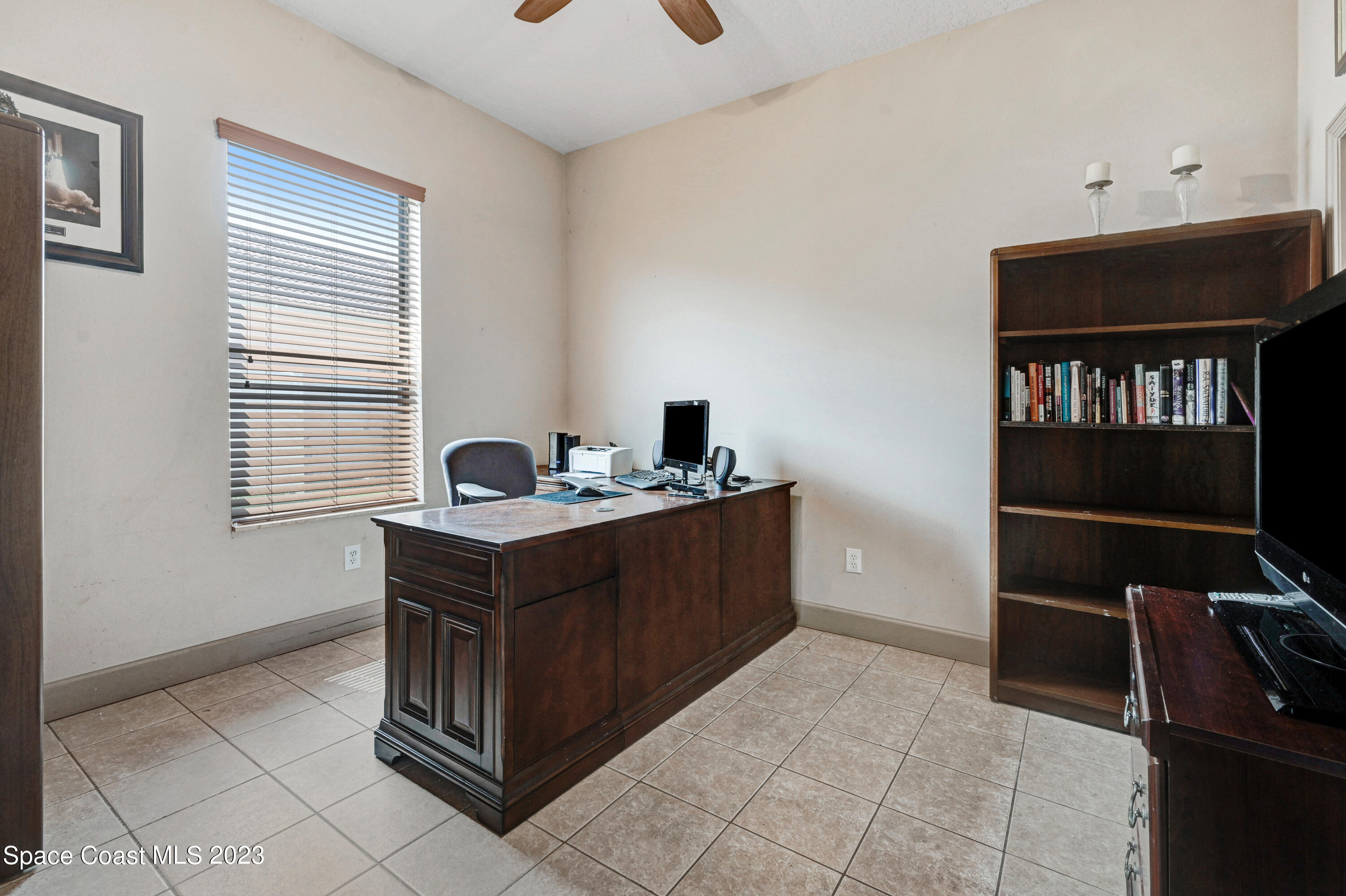 1317 Centennial Way Rockledge, FL 32955 - Photo 28 of 38 a room with furniture and window