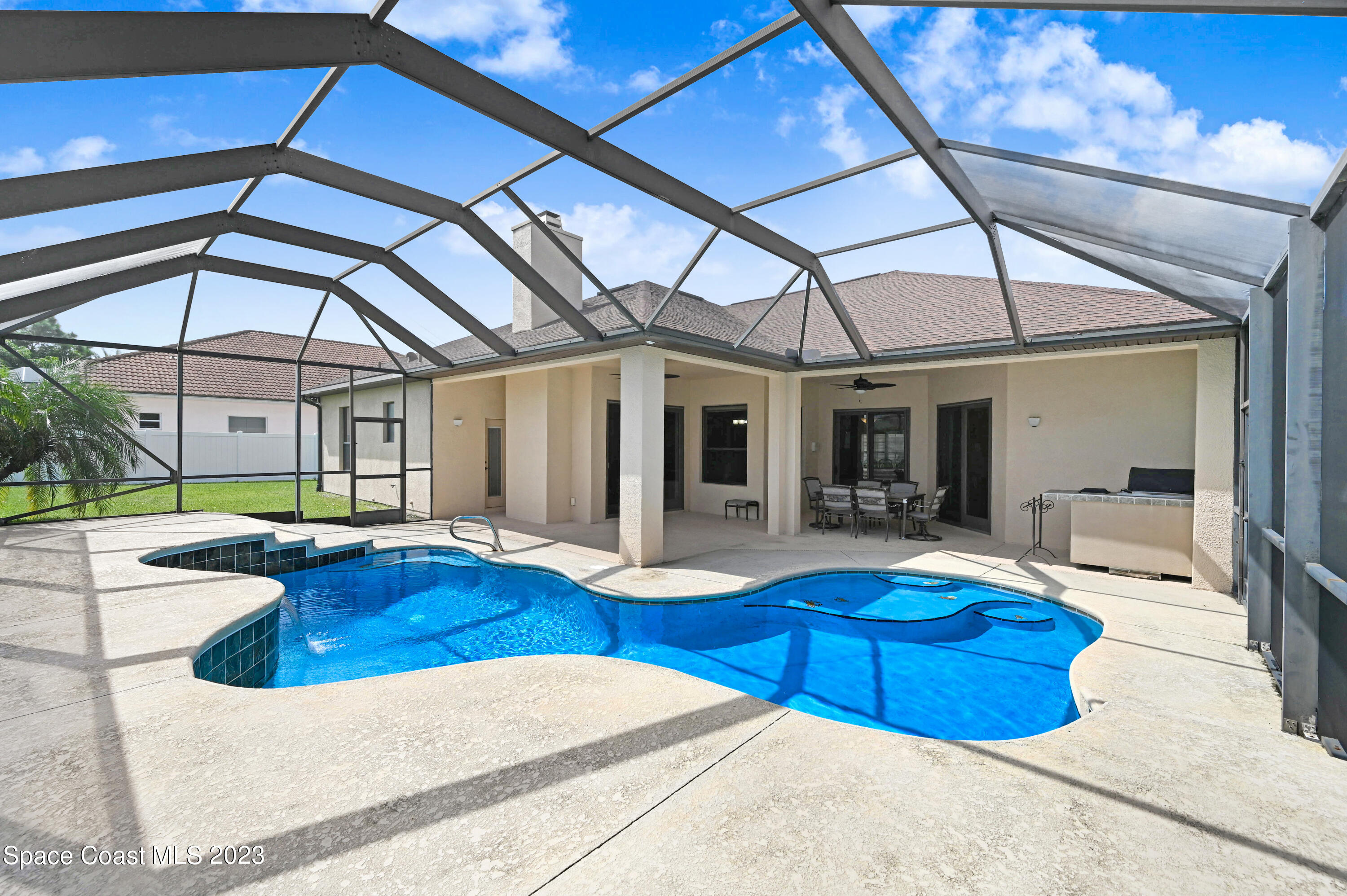 1317 Centennial Way Rockledge, FL 32955 - Photo 35 of 38 a view of swimming pool with outdoor seating