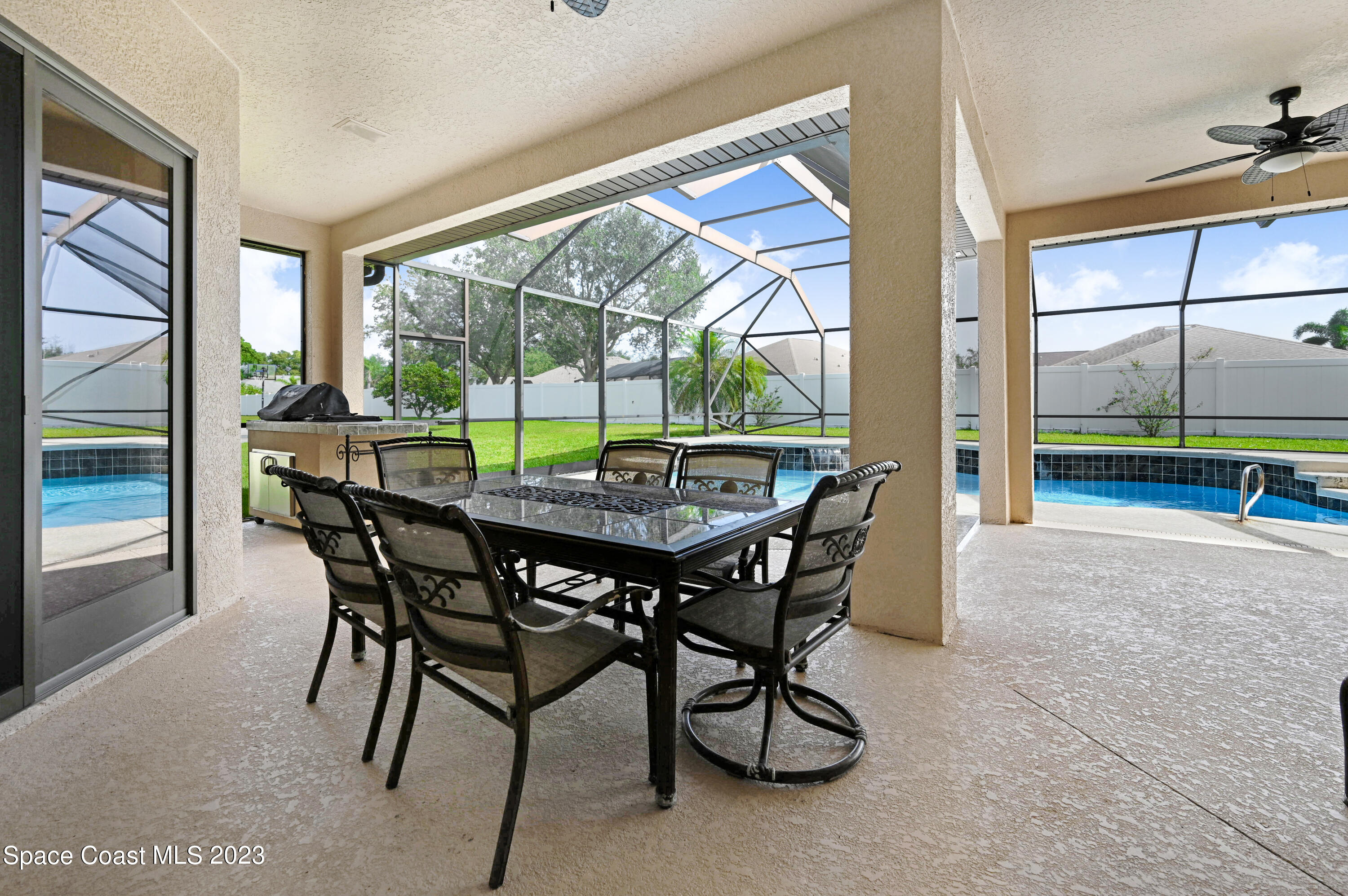 1317 Centennial Way Rockledge, FL 32955 - Photo 37 of 38 a view of a dining room with furniture window and outside view