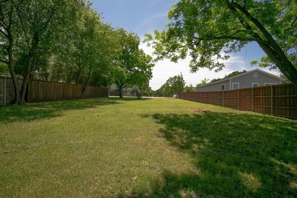 1000 Hughes Road Grapevine, TX 76051 - Photo 11 of 15 a view of a back yard