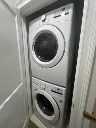 a utility room with dryer and washer