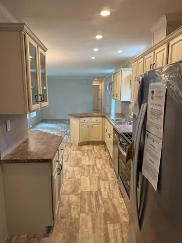 $179,900 | 9 Sargents Place, Unit 113, Gilford, NH 03249