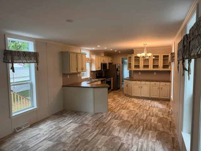 $179,900 | 9 Sargents Place, Unit 113, Gilford, NH 03249