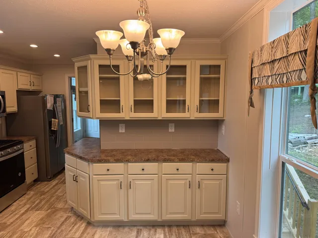 $179,900 | 9 Sargents Place, Unit 113, Gilford, NH 03249