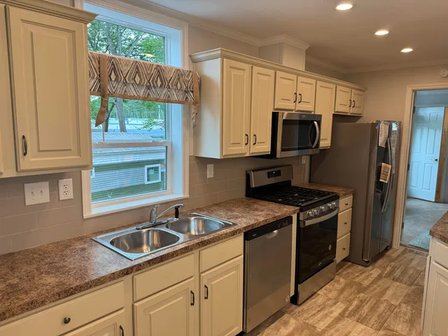 $179,900 | 9 Sargents Place, Unit 113, Gilford, NH 03249