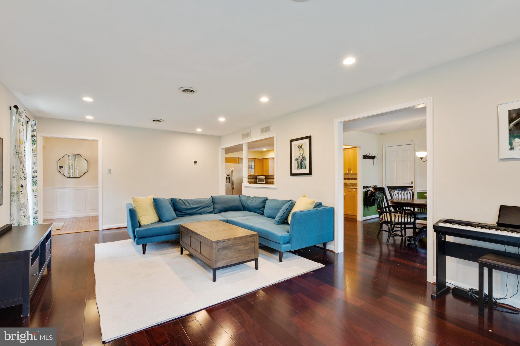 Recessed lighting and hardwood floors.