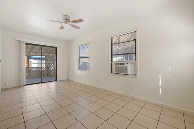 a view of an empty room and window