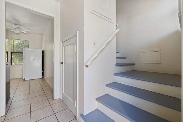 a view of entryway and hall with a rug