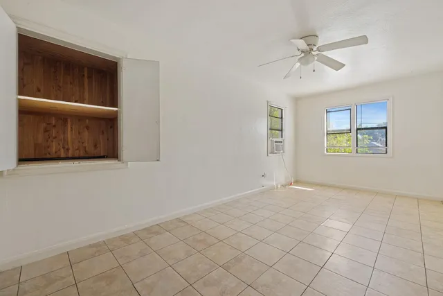 a view of an empty room and window