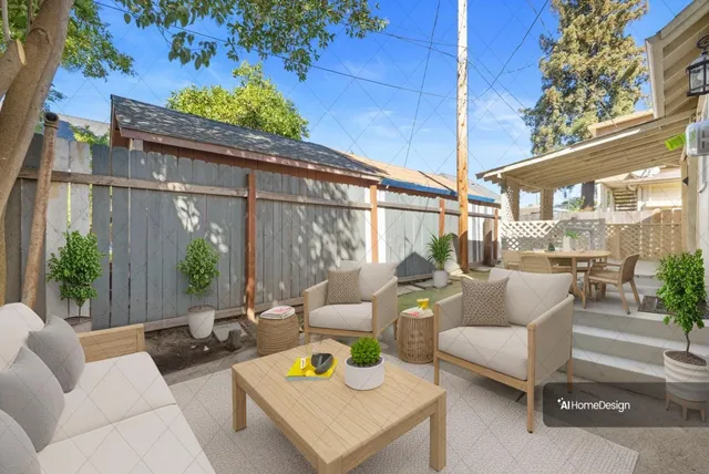 a view of a patio with couches and potted plants