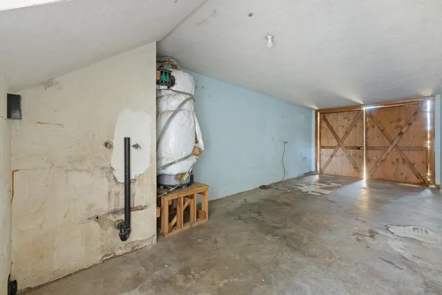 a view of a room with rack on the wall