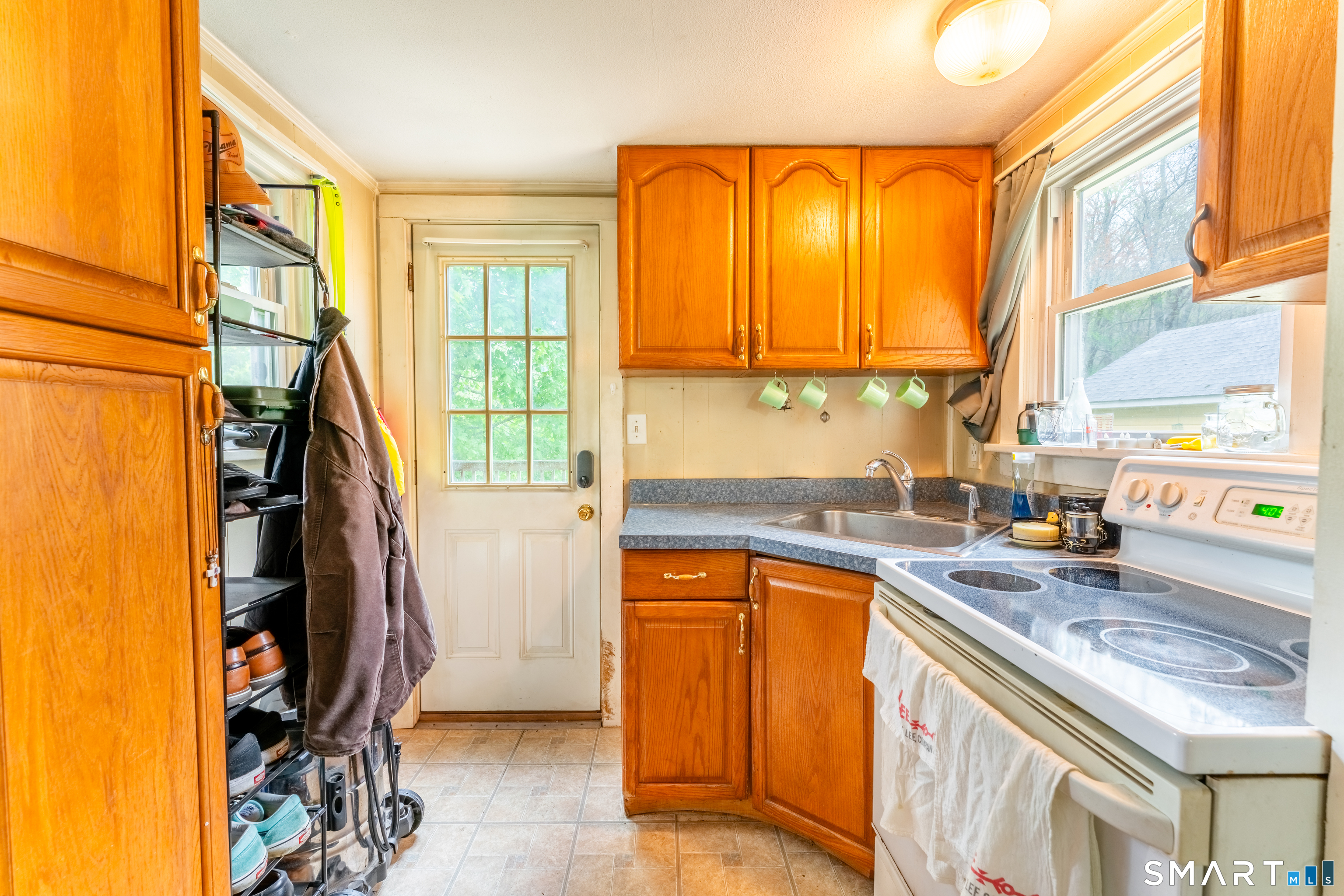 1007 Long Cove Road Ledyard, CT 06335 - Photo 12 of 19 a kitchen that has a sink and a window