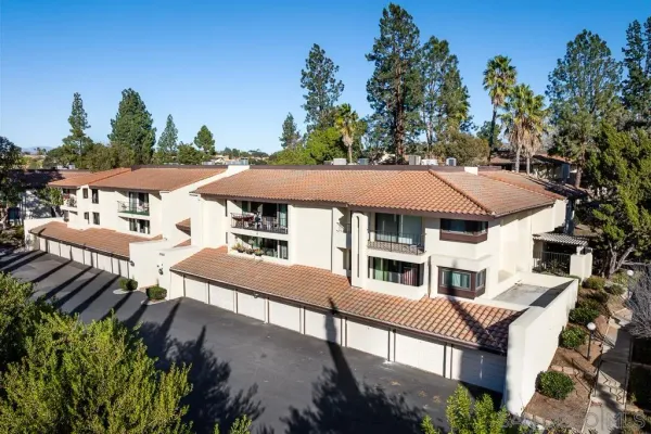 an aerial view of a house with garden view