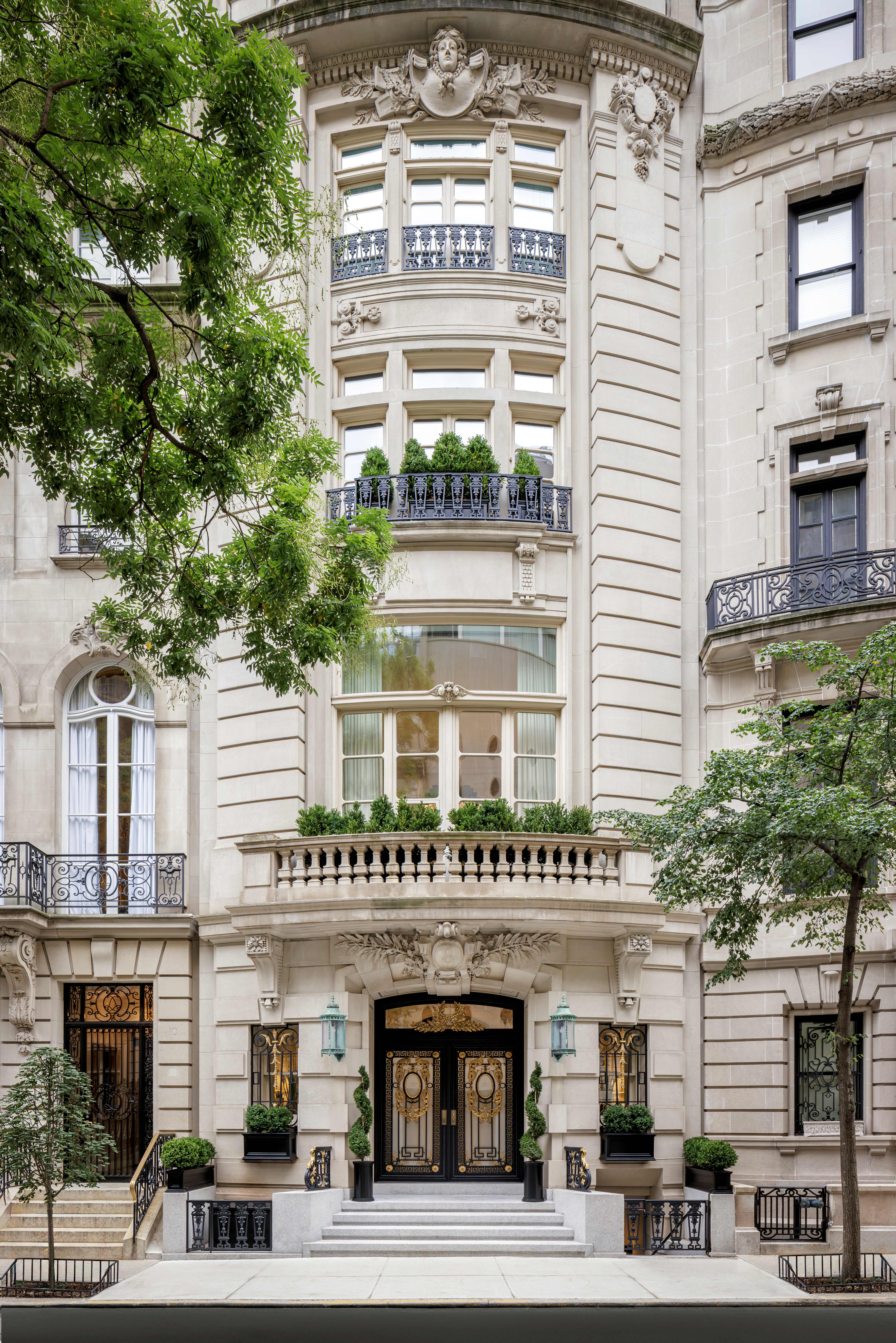 a front view of a building and a yard