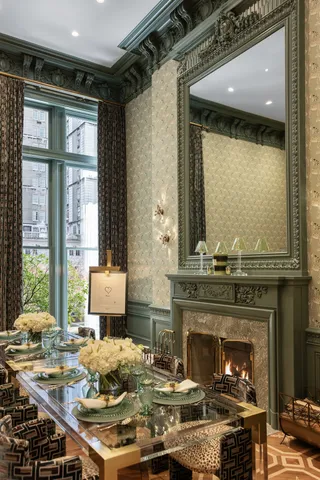 a bathroom with mirror and vanity