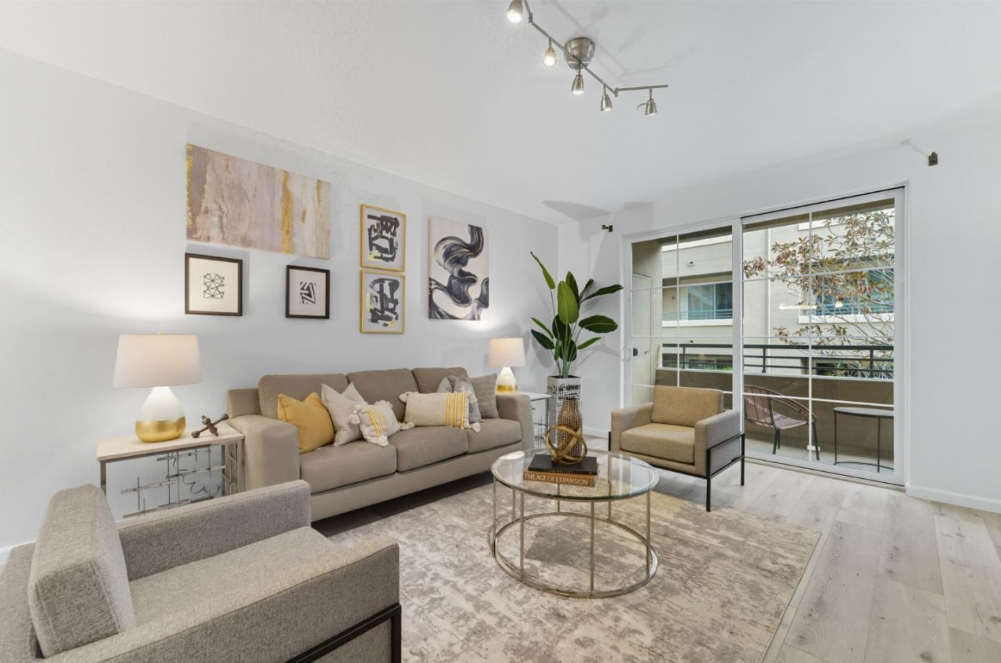 1388 Broadway, Unit 201 Millbrae, CA 94030 - Photo 1 of 33 a living room with furniture and a large window