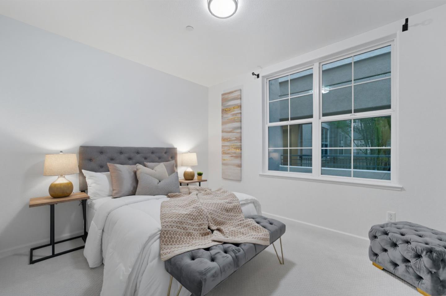 1388 Broadway, Unit 201 Millbrae, CA 94030 - Photo 14 of 33 a bedroom with a bed and window