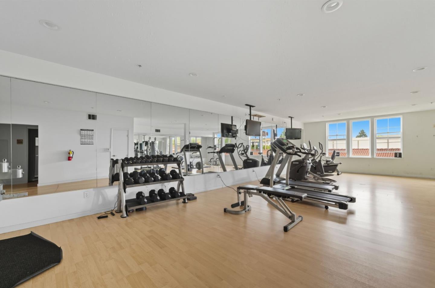 1388 Broadway, Unit 201 Millbrae, CA 94030 - Photo 24 of 33 a view of a room with gym equipment