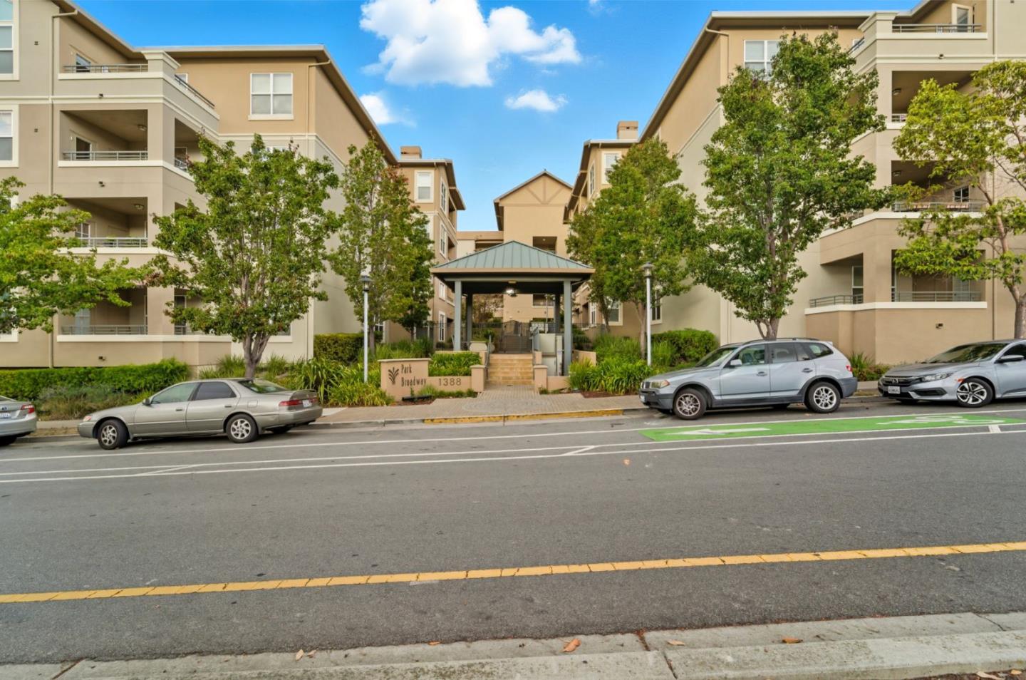 1388 Broadway, Unit 201 Millbrae, CA 94030 - Photo 30 of 33 a view of a car parked in front of a building