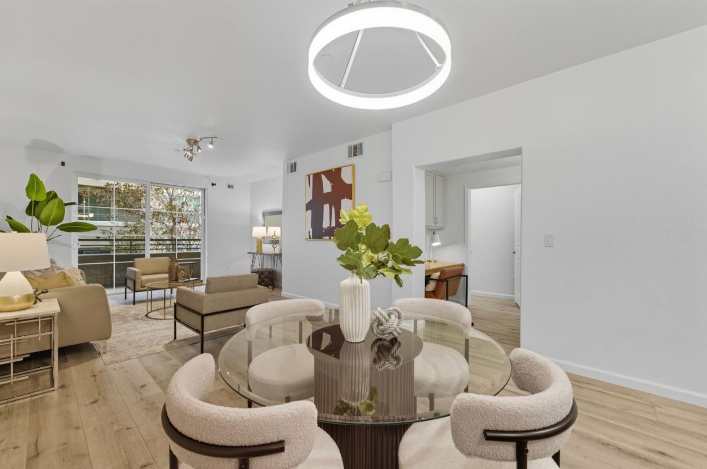 1388 Broadway, Unit 201 Millbrae, CA 94030 - Photo 7 of 33 a living room with furniture and a large window
