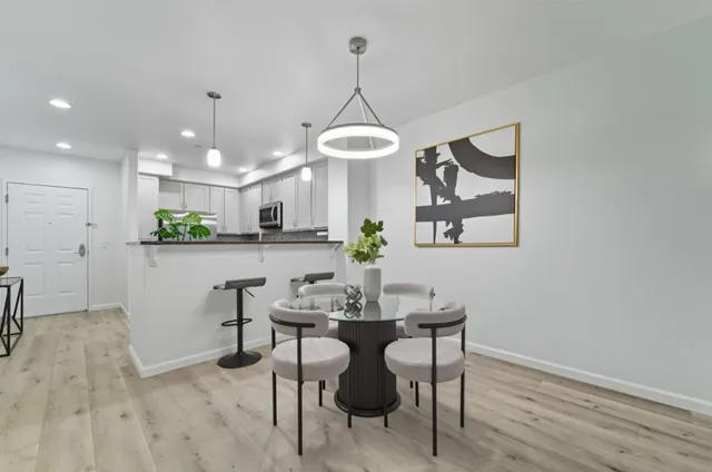 a room with storage and utility room with wooden floor