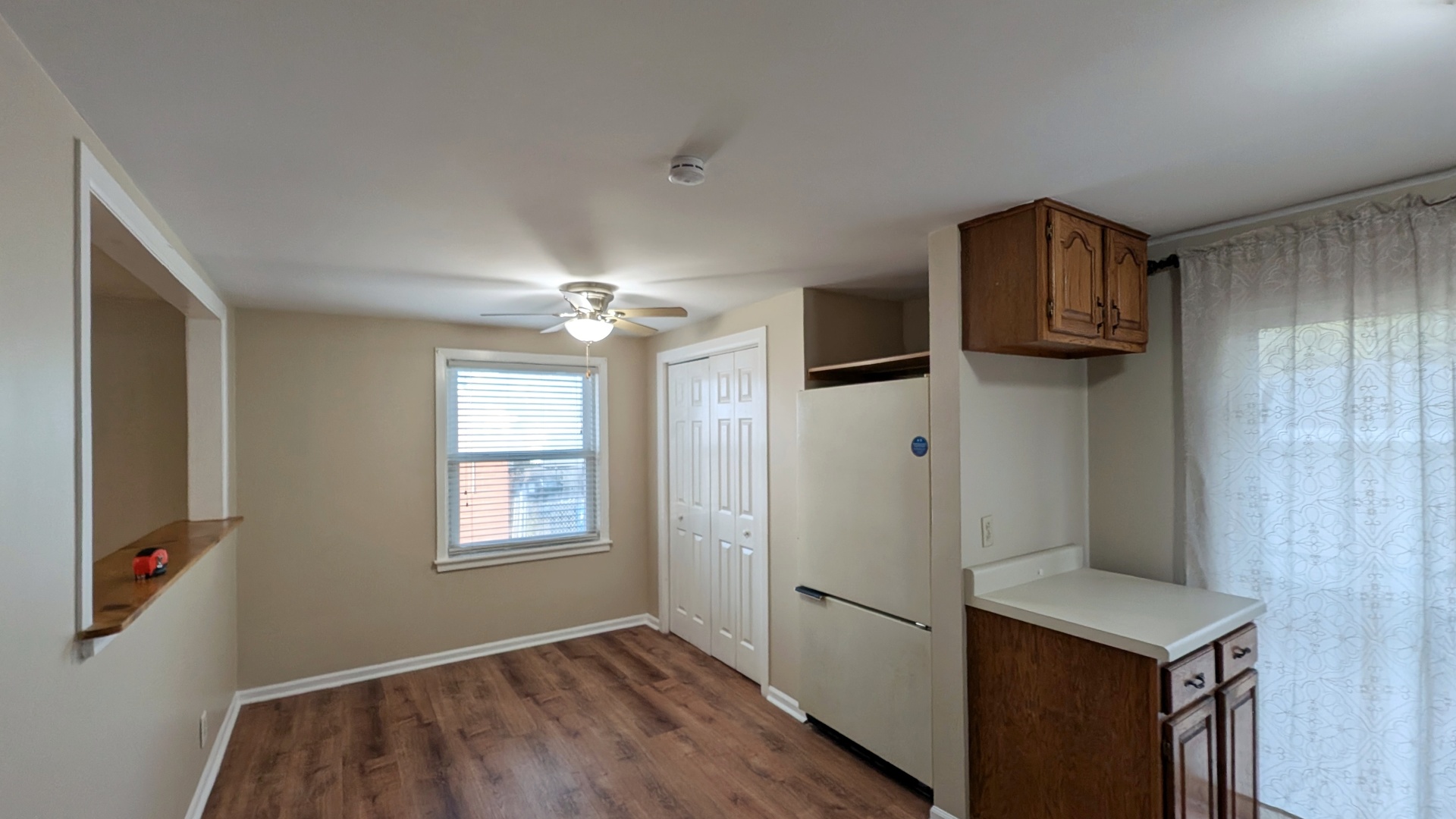 1710 North Raynor Avenue Crest Hill, IL 60403 - Photo 3 of 8 a view of a kitchen cabinets and wooden floor
