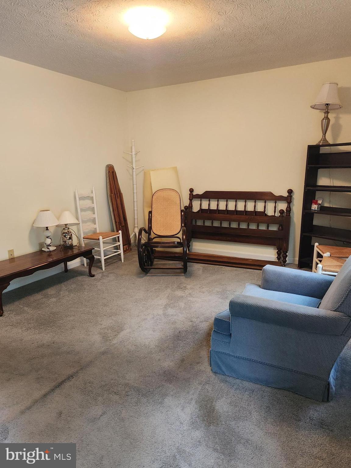 6017 Maple Road St. Leonard, MD 20685 - Photo 6 of 13 a bedroom with furniture and a couch