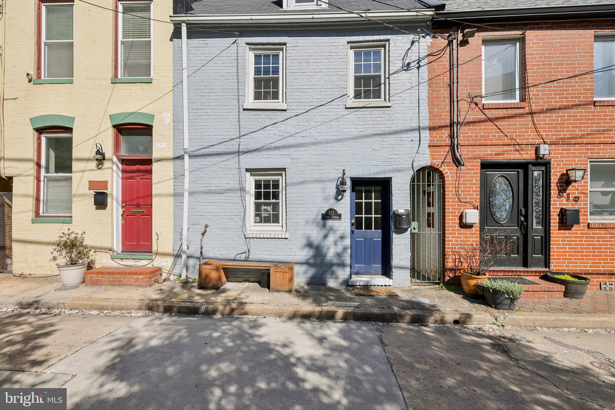 617 South Durham Street Baltimore, MD 21231 - Photo 36 of 42 a front view of a building with two chairs