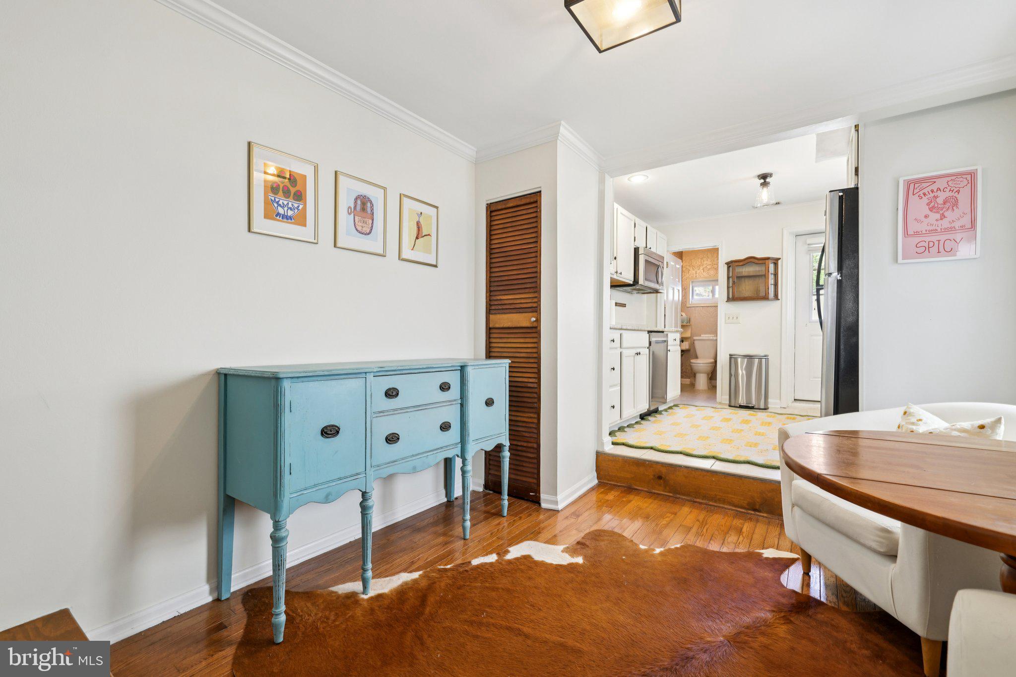 617 South Durham Street Baltimore, MD 21231 - Photo 5 of 42 a room with furniture and a wooden floor