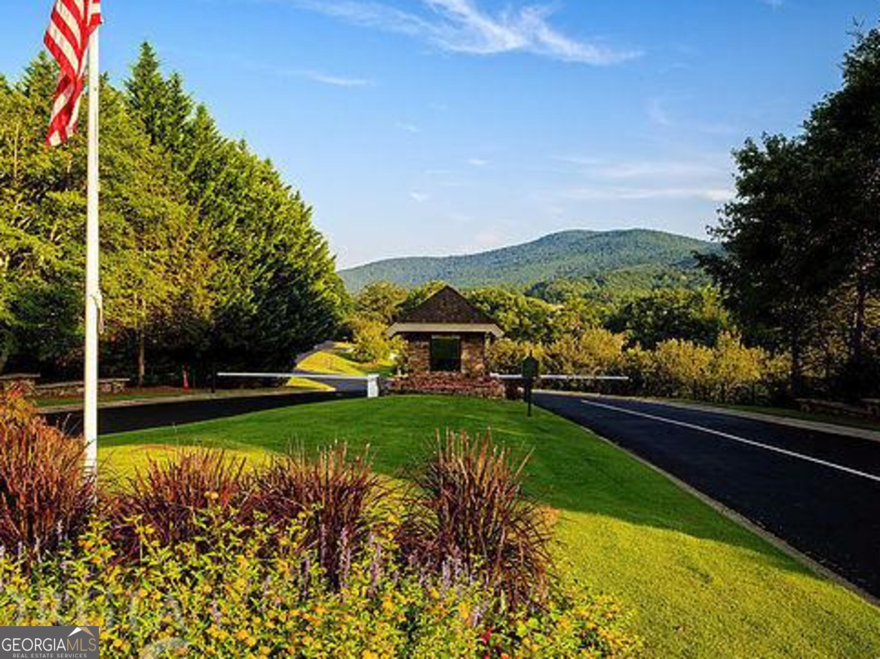 0 Early Red Pippin, Unit 1818 Clarkesville, GA 30523 - Photo 2 of 6 a view of a house with a yard