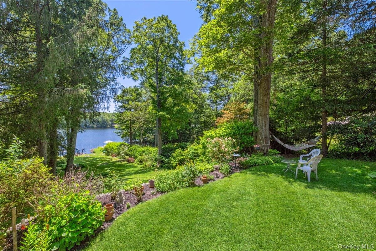 342 Lake Shore Road Putnam Valley, NY 10579 - Photo 36 of 46 View of green lawn with a water view