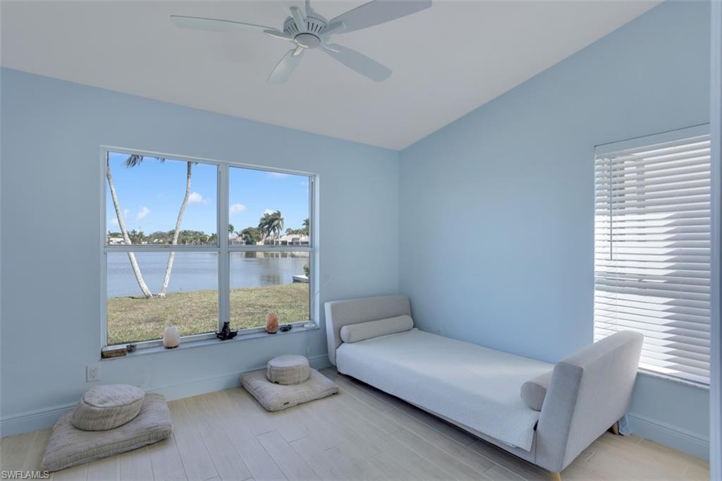 7311 Mill Pond Circle Naples, FL 34109 - Photo 18 of 22 a living room with furniture