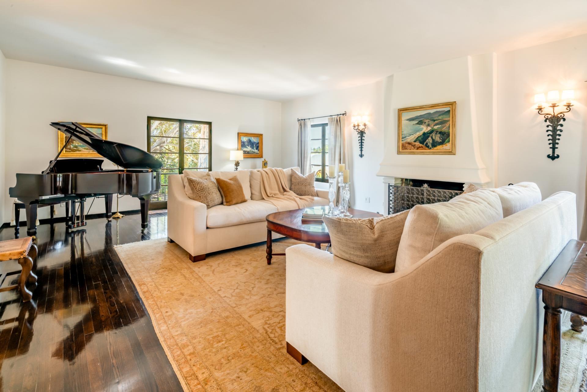1098 Golf Road Montecito, CA 93108 - Photo 12 of 62 a living room with furniture and wooden floor